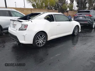 2014 Scion tC z VIN JTKJF5C77E3080128, wystawiony jako IAAI lot #42174898 z przebiegiem Nie podano mil oraz . Historia ofert i sprzedaży dostępna na DreamBid. Obrazek 4.