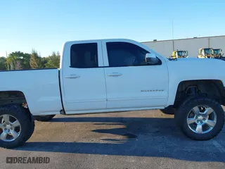 2017 Chevrolet Silverado 1500 LT with VIN 1GCVKREC7HZ216507, listed as a IAAI auction lot 41828407 with 138,294 mi miles. Bid and sale history available at carsss.com. Image 13.