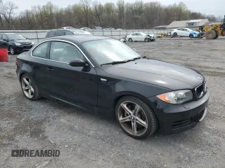 2009 BMW 1 Series 135i with VIN WBAUC73519VK79934, listed as a Copart auction lot 50781795 with 96,817 mi miles and Salvage title. Bid and sale history available at DreamBid. Image 4.