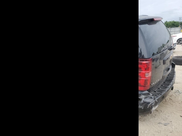 2008 Chevrolet Tahoe LS with VIN 1GNFC13C48R152651, listed as a Copart auction lot 56142225 with 221,172 mi miles and Salvage title. Bid and sale history available at DreamBid. Image 2.