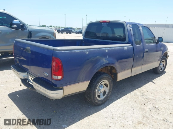 1998 Ford F-150 with VIN 1FTZX1725WKB57987, listed as a IAAI auction lot 42854030 with 210,471 mi miles and . Bid and sale history available at DreamBid. Image 4.