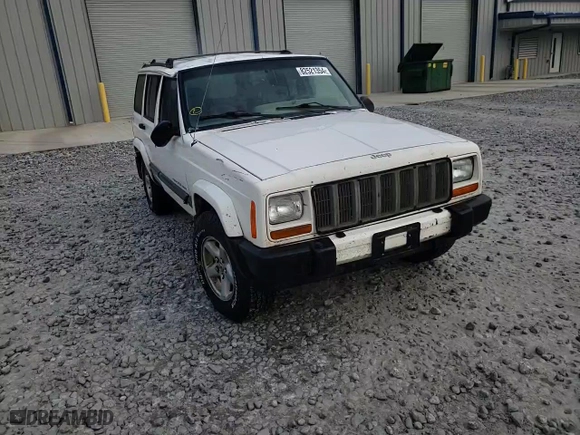 2000 Jeep Cherokee Police with VIN 1J4FF48S2YL241892, listed as a Copart auction lot 82521354 with 189,919 mi miles and Salvage Title. Bid and sale history available at carsss.com. Image 12.