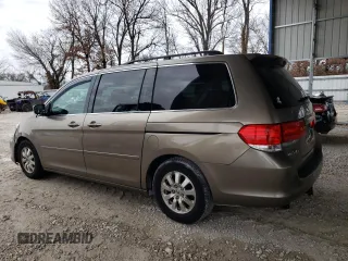 2010 Honda Odyssey EX with VIN 5FNRL3H59AB038104, listed as a Copart auction lot 84688894 with 317,028 mi miles and Salvage title. Bid and sale history available at DreamBid. Image 2.
