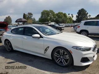 2023 BMW 8 Series 840i with VIN WBAGV4C01PCL65666, listed as a Copart auction lot 47543754 with 31,703 mi miles. Bid and sale history available at carsss.com. Image 4.