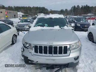 2011 Jeep Grand Cherokee 70th Anniversary with VIN 1J4RR4GGXBC609633, listed as a IAAI auction lot 41469526 with 138,439 mi miles. Bid and sale history available at carsss.com. Image 12.