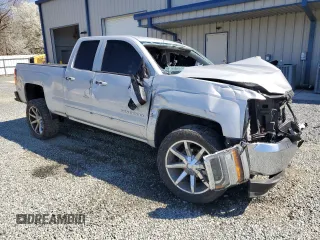 2018 Chevrolet Silverado 1500 LT with VIN 1GCRCREH0JZ158238, listed as a Copart auction lot 48698145 with Not Provided miles and Salvage Title. Bid and sale history available at DreamBid. Image 4.