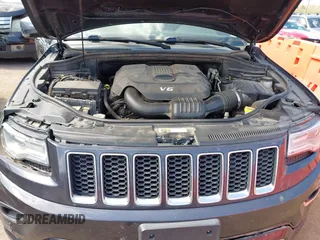 2015 Jeep Grand Cherokee Overland with VIN 1C4RJFCG6FC831641, listed as a IAAI auction lot 41877680 with 143,568 mi miles. Bid and sale history available at carsss.com. Image 10.