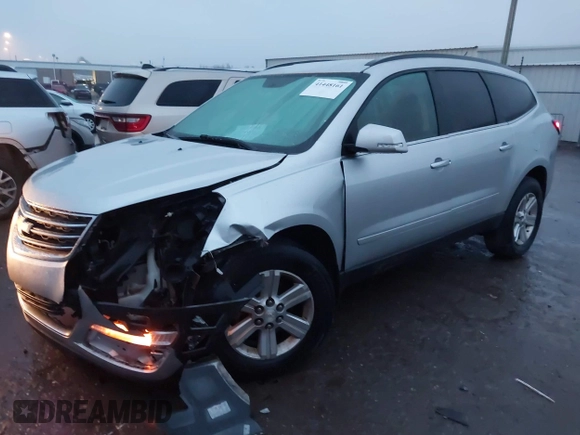 2013 Chevrolet Traverse LT with VIN 1GNKVGKD9DJ265459, listed as a IAAI auction lot 41448161 with 170,527 mi miles and . Bid and sale history available at DreamBid. Image 2.
