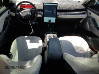 2021 Ford Mustang Mach-E Premium z VIN 3FMTK3SUXMMA10218, wystawiony jako Copart lot #56288255 z przebiegiem 63 334 mil mil oraz Szkoda całkowita • Salvage title. Historia ofert i sprzedaży dostępna na DreamBid. Obrazek 8.