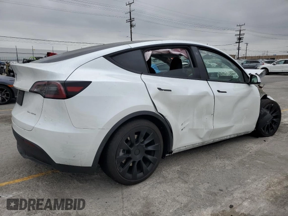 2023 Tesla Model Y Long Range z VIN 7SAYGDEE9PA070232, wystawiony jako Copart lot #55881805 z przebiegiem 38 276 mil mil oraz Szkoda całkowita • Salvage title. Historia ofert i sprzedaży dostępna na DreamBid. Obrazek 3.