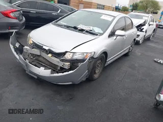2011 Honda Civic LX with VIN 2HGFA1F54BH303802, listed as a IAAI auction lot 42195289 with 101,882 mi miles and . Bid and sale history available at DreamBid. Image 2.