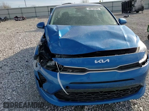 2023 Kia Rio S z VIN 3KPA24AD2PE529734, wystawiony jako Copart lot #48755585 z przebiegiem 99 031 mil mil oraz Szkody całkowita. Historia ofert i sprzedaży dostępna na DreamBid. Obrazek 11.