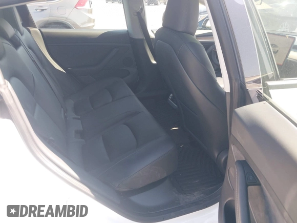 2023 Tesla Model 3 with VIN 5YJ3E1EA0PF548498, listed as a IAAI auction lot 42334326 with 17,674 mi miles and . Bid and sale history available at DreamBid. Image 8.