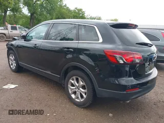 2015 Mazda CX-9 Sport with VIN JM3TB3BV1F0466070, listed as a IAAI auction lot 42350686 with 110,818 mi miles and . Bid and sale history available at DreamBid. Image 3.