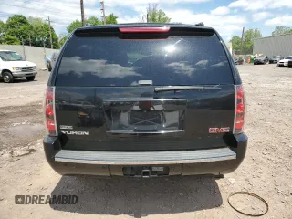 2011 GMC Yukon Denali z VIN 1GKS2EEF2BR308951, wystawiony jako Copart lot #57052825 z przebiegiem 217 895 mil mil oraz Tytuł czysty. Historia ofert i sprzedaży dostępna na DreamBid. Obrazek 6.