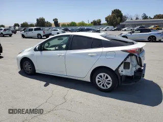 2016 Toyota Prius Two z VIN JTDKBRFU0G3016161, wystawiony jako Copart lot #59258175 z przebiegiem 149 447 mil mil oraz Szkoda całkowita • Salvage title. Historia ofert i sprzedaży dostępna na DreamBid. Obrazek 2.
