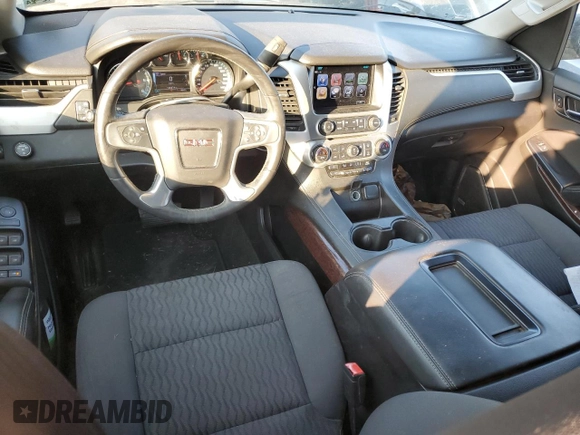 2017 GMC Yukon SLE with VIN 1GKS1AKC3HR307466, listed as a Copart auction lot 77559704 with 130,274 mi miles and Salvage Title. Bid and sale history available at carsss.com. Image 8.