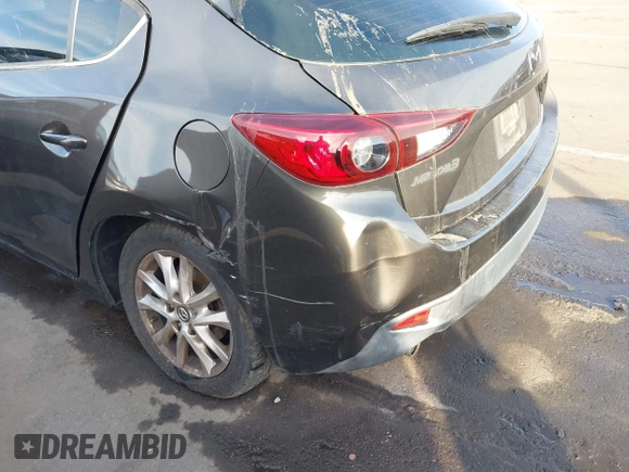 2015 Mazda 3 i Touring with VIN 3MZBM1L74FM236410, listed as a IAAI auction lot 41339253 with 119,731 mi miles and . Bid and sale history available at DreamBid. Image 16.