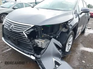 2016 Lexus RX 350 z VIN 2T2BZMCA5GC052214, wystawiony jako IAAI lot #42669843 z przebiegiem 93 891 mil mil oraz . Historia ofert i sprzedaży dostępna na DreamBid. Obrazek 6.