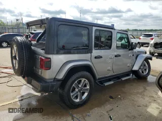 2020 Jeep Wrangler Unlimited Sahara with VIN 1C4HJXEG7LW297722, listed as a Copart auction lot 55295025 with 69,064 mi miles and Salvage title. Bid and sale history available at DreamBid. Image 3.