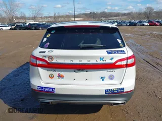 2016 Lincoln MKX Reserve with VIN 2LMTJ8LR4GBL44989, listed as a IAAI auction lot 41684823 with 101,528 mi miles. Bid and sale history available at carsss.com. Image 16.