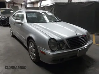 2001 Mercedes-Benz CLK with VIN WDBLJ65GX1T091389, listed as a IAAI auction lot 42058375 with 215,750 mi miles. Bid and sale history available at carsss.com. Image 1.