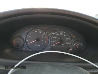 1999 Acura Integra z VIN JH4DB7668XS005069, wystawiony jako Copart lot #61384394 z przebiegiem 207 353 mil mil oraz Szkoda całkowita • Salvage title. Historia ofert i sprzedaży dostępna na DreamBid. Obrazek 9.