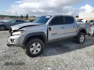 2018 Toyota Tacoma SR z VIN 3TMCZ5AN0JM179343, wystawiony jako Copart lot #51454365 z przebiegiem 70 896 mil mil oraz Szkoda całkowita • Salvage title. Historia ofert i sprzedaży dostępna na DreamBid. Obrazek 1.