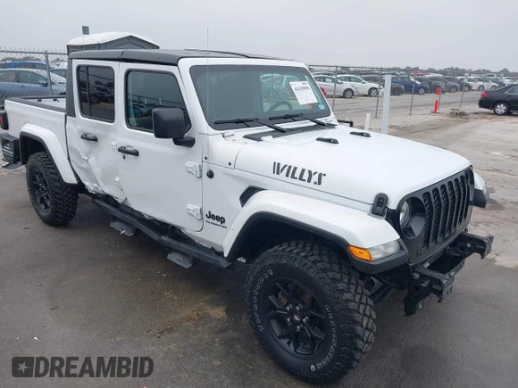 2021 Jeep Gladiator Willys with VIN 1C6HJTAG1ML575474, listed as a IAAI auction lot 41439898 with 44,335 mi miles and . Bid and sale history available at DreamBid. Image 1.