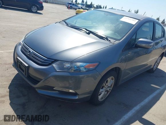 2010 Honda Insight EX with VIN JHMZE2H72AS015870, listed as a IAAI auction lot 42762384 with 58,121 mi miles and . Bid and sale history available at DreamBid. Image 2.