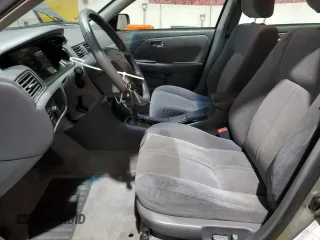 2001 Toyota Camry CE z VIN JT2BG28K810573972, wystawiony jako Copart lot #51733485 z przebiegiem 143 665 mil mil oraz Szkoda całkowita • Salvage title. Historia ofert i sprzedaży dostępna na DreamBid. Obrazek 7.