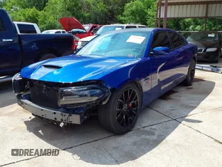 2019 Dodge Charger Scat Pack with VIN 2C3CDXGJ8KH588905, listed as a IAAI auction lot 42211811 with 50,298 mi miles and . Bid and sale history available at carsss.com. Image 2.