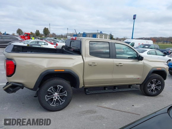 2024 GMC Canyon 4WD AT4 with VIN 1GTP6DEK8R1179023, listed as a IAAI auction lot 40930724 with 3,235 mi miles. Bid and sale history available at carsss.com. Image 14.