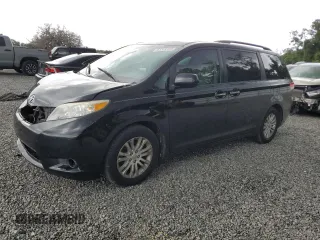 2012 Toyota Sienna XLE AAS with VIN 5TDYK3DC1CS279236, listed as a Copart auction lot 63329165 with 143,937 mi miles and Salvage title. Bid and sale history available at DreamBid. Image 1.