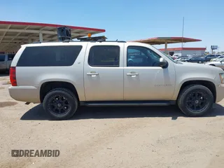 2013 Chevrolet Suburban LT with VIN 1GNSKJE70DR127208, listed as a IAAI auction lot 42285279 with 295,930 mi miles and . Bid and sale history available at DreamBid. Image 13.