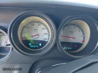 2010 Dodge Challenger SE with VIN 2B3CJ4DV0AH323373, listed as a IAAI auction lot 42081412 with 199,977 mi miles. Bid and sale history available at carsss.com. Image 7.