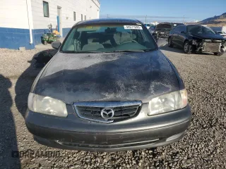 2000 Mazda 626 LX with VIN 1YVGF22D5Y5120152, listed as a Copart auction lot 44571595 with 177,624 mi miles and Salvage Title. Bid and sale history available at carsss.com. Image 5.