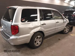 2005 Honda Pilot EX-L with VIN 5FNYF18635B056717, listed as a IAAI auction lot 42197100 with 80,400 mi miles and . Bid and sale history available at DreamBid. Image 4.