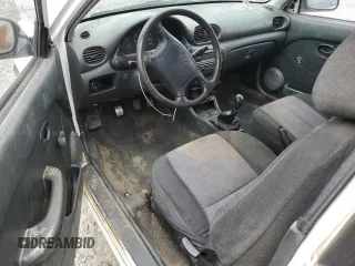 1999 Hyundai Accent z VIN KMHVD14N9XU503210, wystawiony jako Copart lot #56486325 z przebiegiem 195 501 mil mil oraz Szkody całkowita. Historia ofert i sprzedaży dostępna na DreamBid. Obrazek 8.