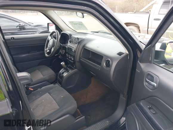 2014 Jeep Patriot Sport with VIN 1C4NJPBA4ED844253, listed as a IAAI auction lot 41879323 with 170,551 mi miles and . Bid and sale history available at carsss.com. Image 5.