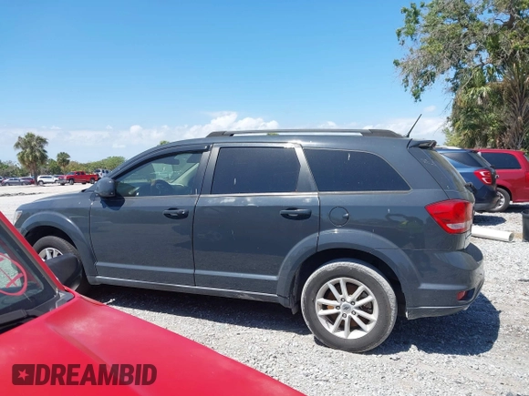 2018 Dodge Journey SXT with VIN 3C4PDCBG7JT172075, listed as a IAAI auction lot 41840766 with 64,572 mi miles and . Bid and sale history available at carsss.com. Image 13.