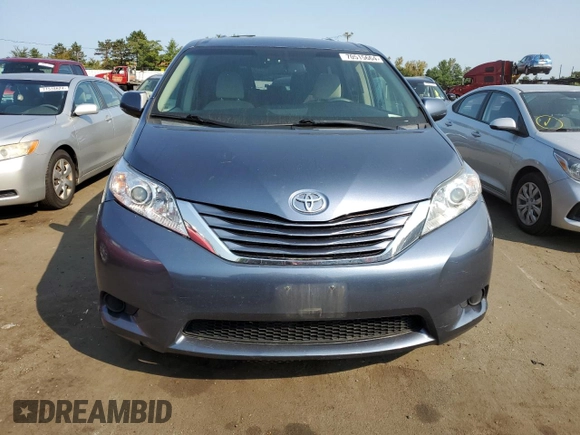 2016 Toyota Sienna LE with VIN 5TDJK3DC2GS133323, listed as a Copart auction lot 70515664 with 106,750 mi miles and Salvage Title. Bid and sale history available at carsss.com. Image 5.