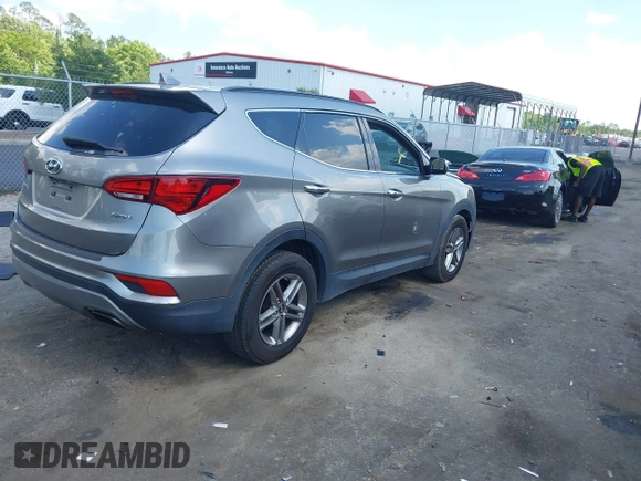 2017 Hyundai Santa Fe 2.4L z VIN 5NMZU3LB7HH025791, wystawiony jako IAAI lot #42277964 z przebiegiem 154 110 mil mil oraz . Historia ofert i sprzedaży dostępna na DreamBid. Obrazek 4.