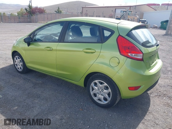2011 Ford Fiesta SE with VIN 3FADP4EJ8BM157173, listed as a IAAI auction lot 41972892 with 407,227 mi miles. Bid and sale history available at carsss.com. Image 3.