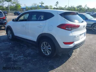 2018 Hyundai Tucson SE with VIN KM8J23A42JU627533, listed as a IAAI auction lot 41880112 with 61,840 mi miles. Bid and sale history available at carsss.com. Image 3.