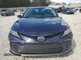 2021 Toyota Camry Hybrid LE with VIN 4T1C31AK9MU557171, listed as a Copart auction lot 48637275 with 77,193 mi miles and Salvage Title. Bid and sale history available at carsss.com. Image 5.