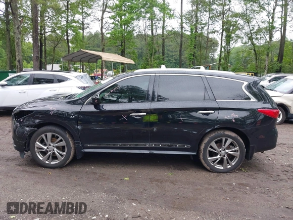 2015 Infiniti QX60 with VIN 5N1AL0MM7FC528002, listed as a IAAI auction lot 42260916 with 228,379 mi miles and . Bid and sale history available at DreamBid. Image 14.