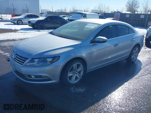2014 Volkswagen CC Sport with VIN WVWBP7AN5EE508465, listed as a IAAI auction lot 41403844 with 97,445 mi miles and . Bid and sale history available at DreamBid. Image 2.