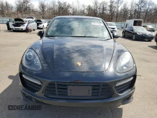 2014 Porsche Cayenne GTS z VIN WP1AD2A26ELA77822, wystawiony jako Copart lot #49171305 z przebiegiem Nie podano mil oraz Tytuł czysty. Historia ofert i sprzedaży dostępna na DreamBid. Obrazek 5.
