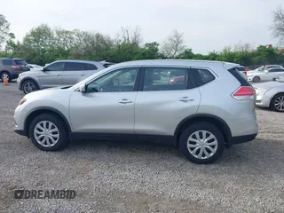 2015 Nissan Rogue S with VIN KNMAT2MV7FP585088, listed as a IAAI auction lot 42138274 with 115,554 mi miles and . Bid and sale history available at DreamBid. Image 14.